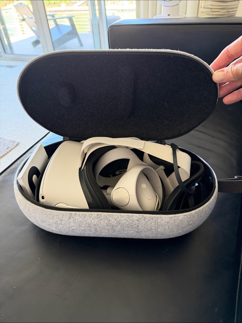 Oculus Standalone VR Headset with White Controllers and Gray Carry Case